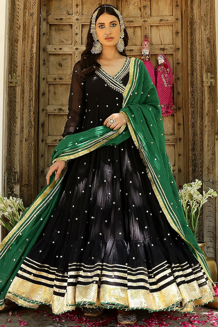 Black Soft Chanderi Mirror Embroidered Angrakha Tiered Party Wear Anarkali Set by SANAM at Pernia's Pop Up Shop