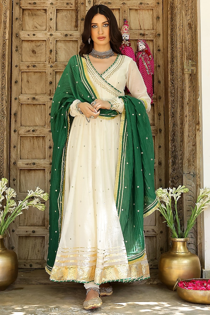 Off-White Soft Chanderi Mirror Embroidered Angrakha Tiered Party Wear Anarkali Set by SANAM at Pernia's Pop Up Shop