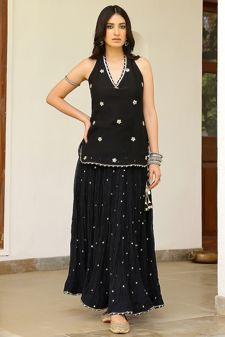 Black Soft Chanderi Mirror Work Crushed Skirt Set by SANAM at Pernia's Pop Up Shop