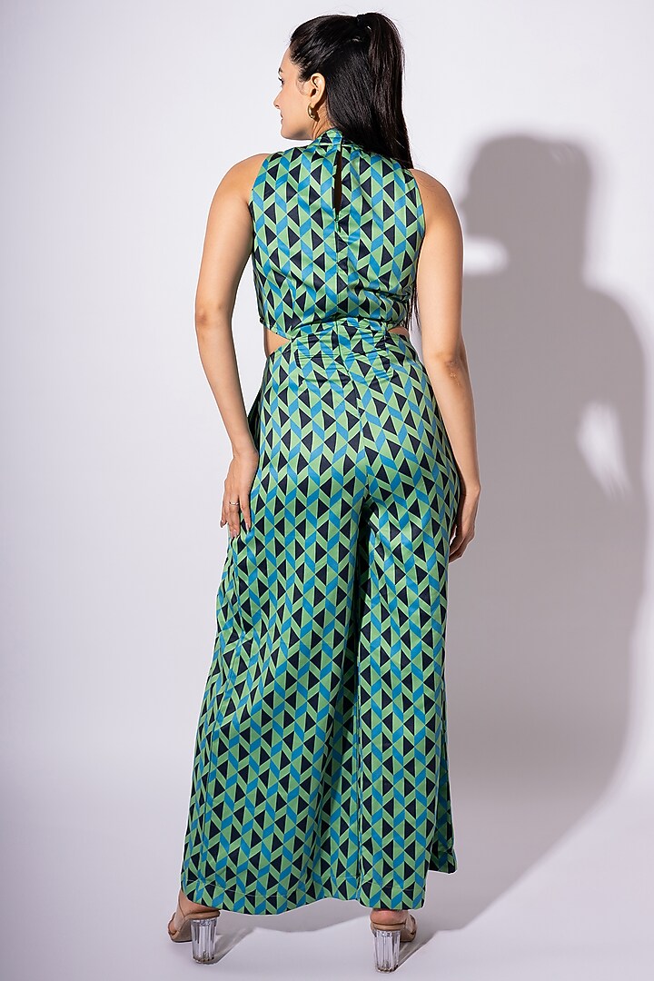 Green Poly Satin Geometric Printed Halter Neck Jumpsuit by Saangi at Pernia's Pop Up Shop