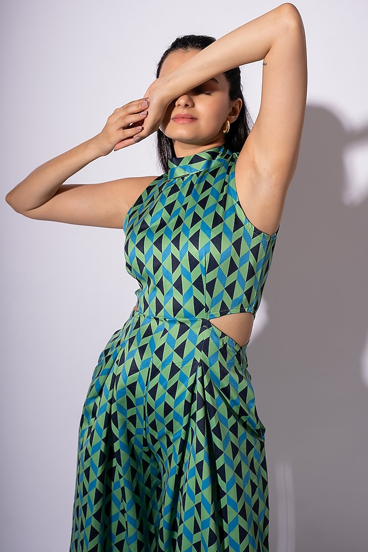 Green Poly Satin Geometric Printed Halter Neck Jumpsuit by Saangi at Pernia's Pop Up Shop