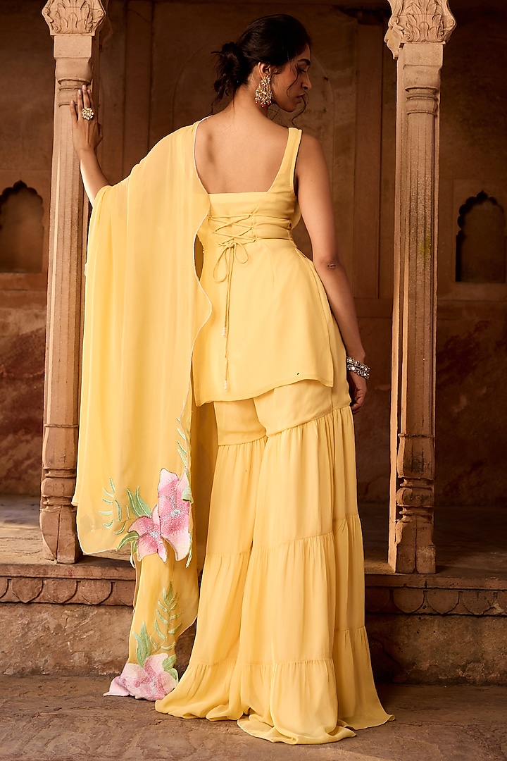 Yellow Georgette 3-Tiered Party Wear Sharara Set by Saanjh by Lea at Pernia's Pop Up Shop