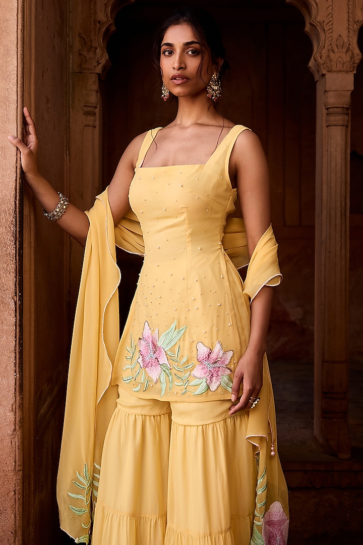 Yellow Georgette 3-Tiered Party Wear Sharara Set by Saanjh by Lea at Pernia's Pop Up Shop