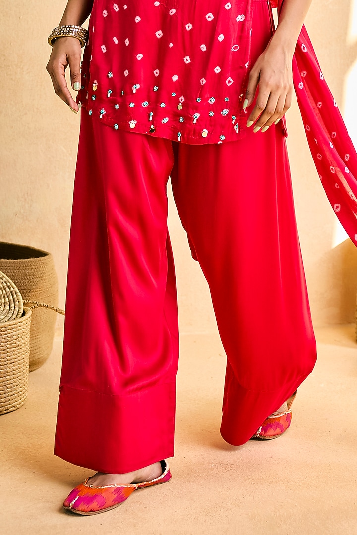 Pink Modal Satin Hand Embroidered Bandhani Kurta Set by Saanjh by Lea at Pernia's Pop Up Shop
