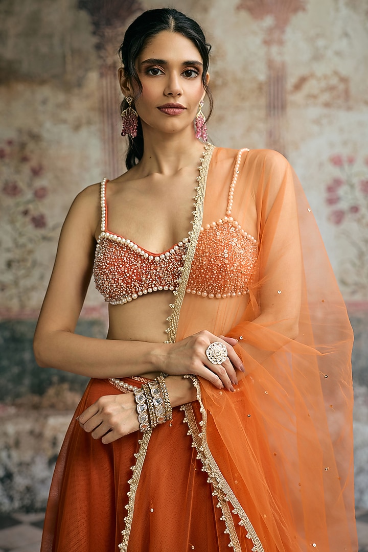 Orange Tulle Hand Embroidered Wedding Lehenga Set by Saanjh by Lea at Pernia's Pop Up Shop