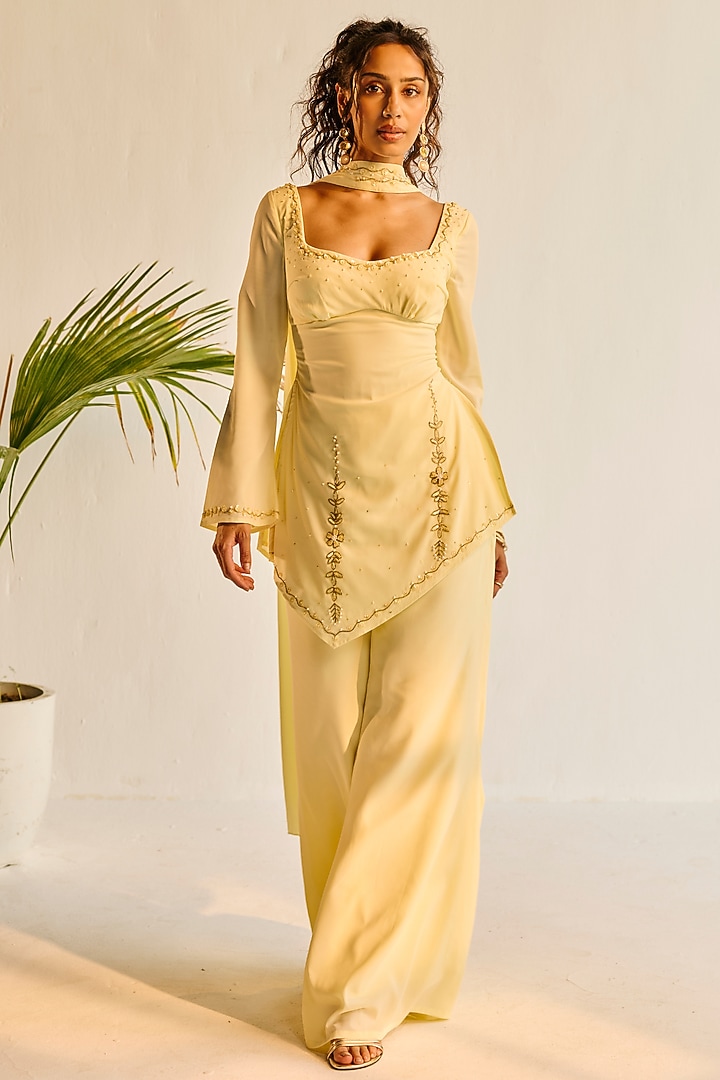 Yellow Fluid Georgette Structured Kurta Set by Saanjh by Lea at Pernia's Pop Up Shop