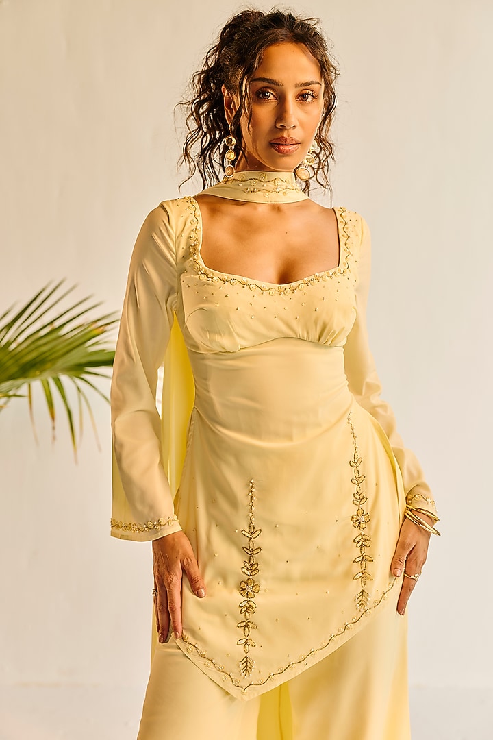 Yellow Fluid Georgette Structured Kurta Set by Saanjh by Lea at Pernia's Pop Up Shop