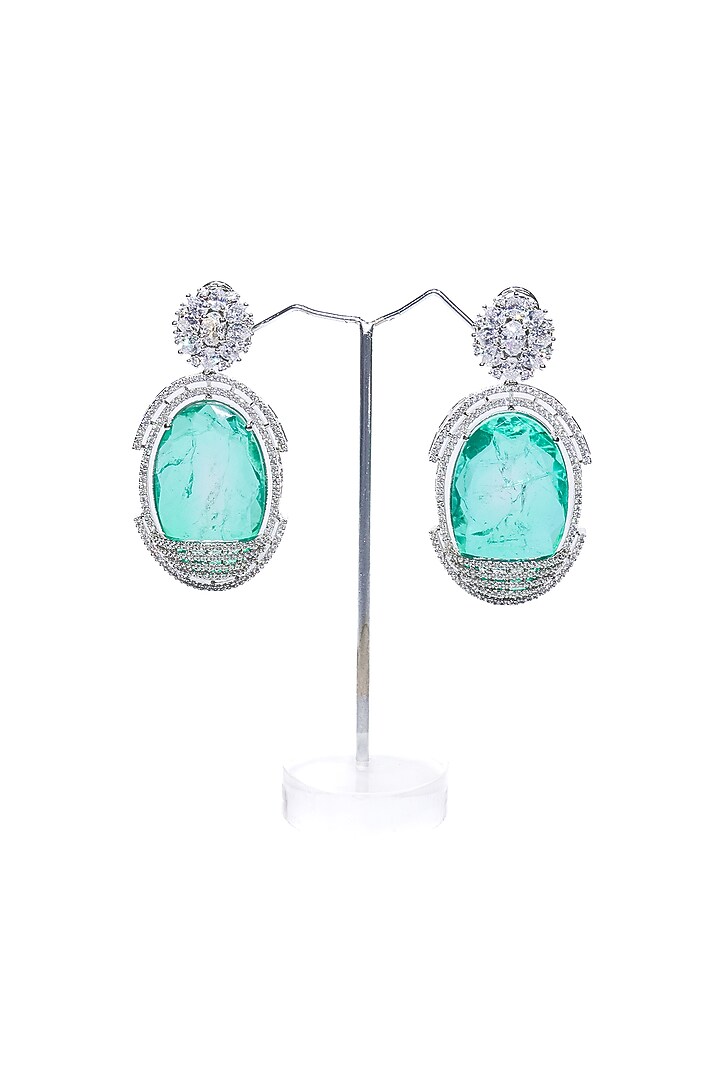 White Finish Green Synthetic Stone Enameled Dangler Earrings by Saptam jewels at Pernia's Pop Up Shop