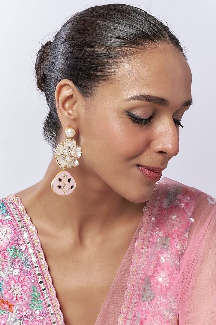 White Finish Pearl Floral Dangler Earrings by Saptam jewels at Pernia's Pop Up Shop