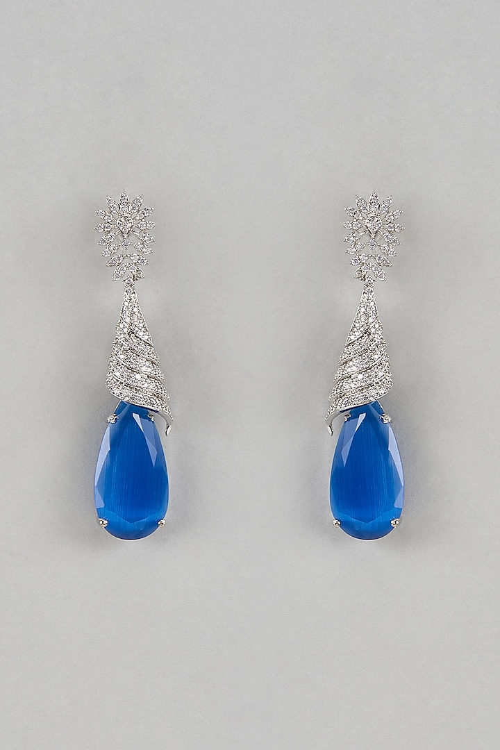 White Finish Blue Stone Teardrop Dangler Earrings by Saptam jewels at Pernia's Pop Up Shop