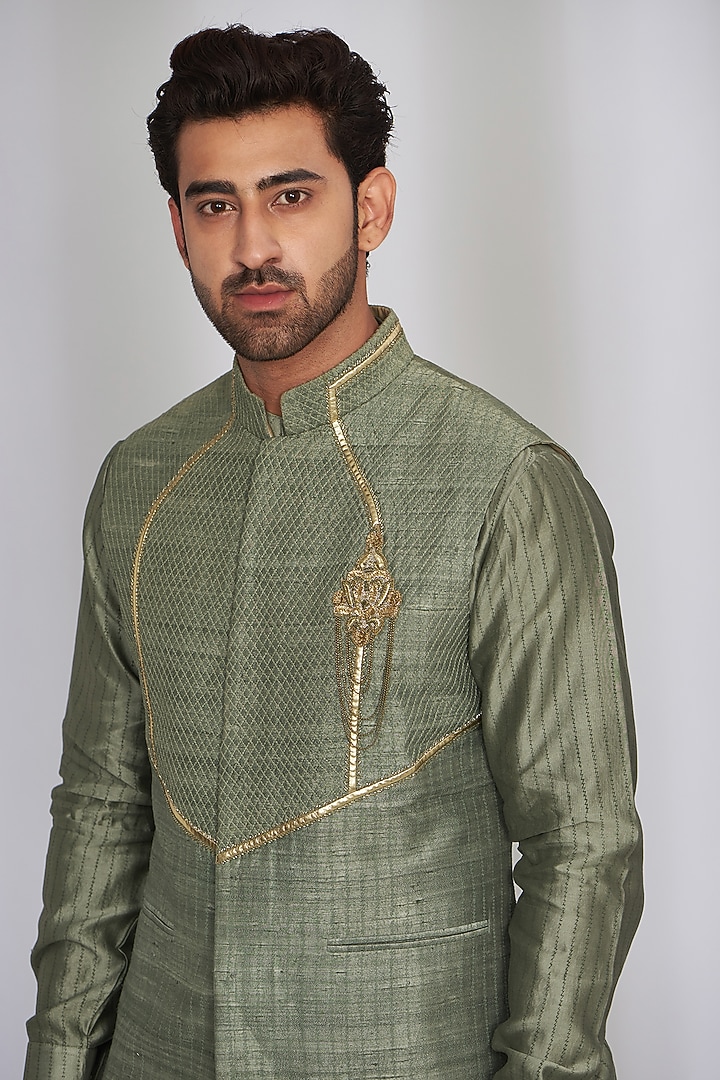 Sage Green Raw Silk Thread Work Bundi Jacket Set by SARAN KOHLI at Pernia's Pop Up Shop