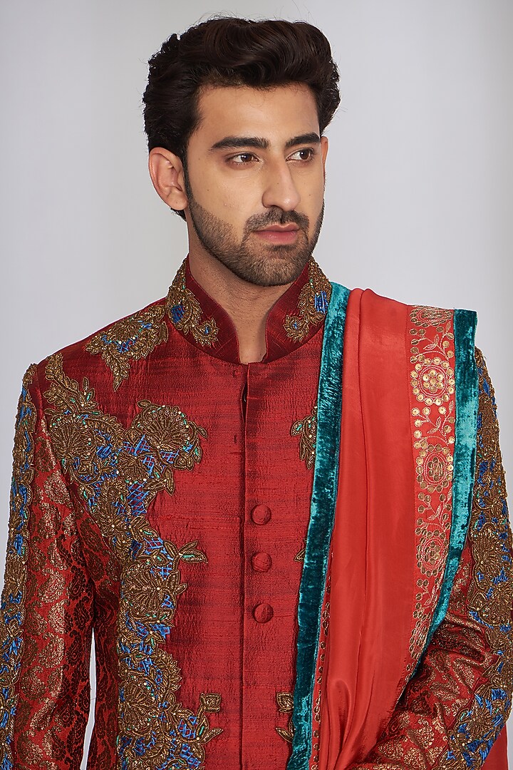 Powder Red Pure Raw Silk Embroidered Groom Sherwani Set by SARAN KOHLI at Pernia's Pop Up Shop