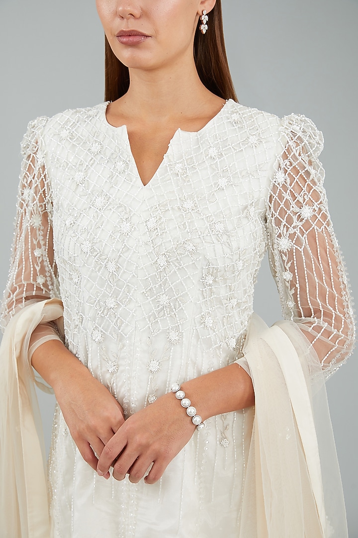 Ivory Viscose Crepe & Net Wedding Sharara Set by Sangeeta Swati at Pernia's Pop Up Shop