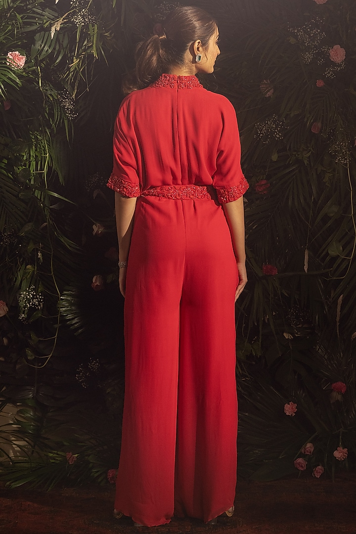 Red Blended Georgette Hand Embroidered Jumpsuit With Belt by Samatvam By Anjali Bhaskar at Pernia's Pop Up Shop