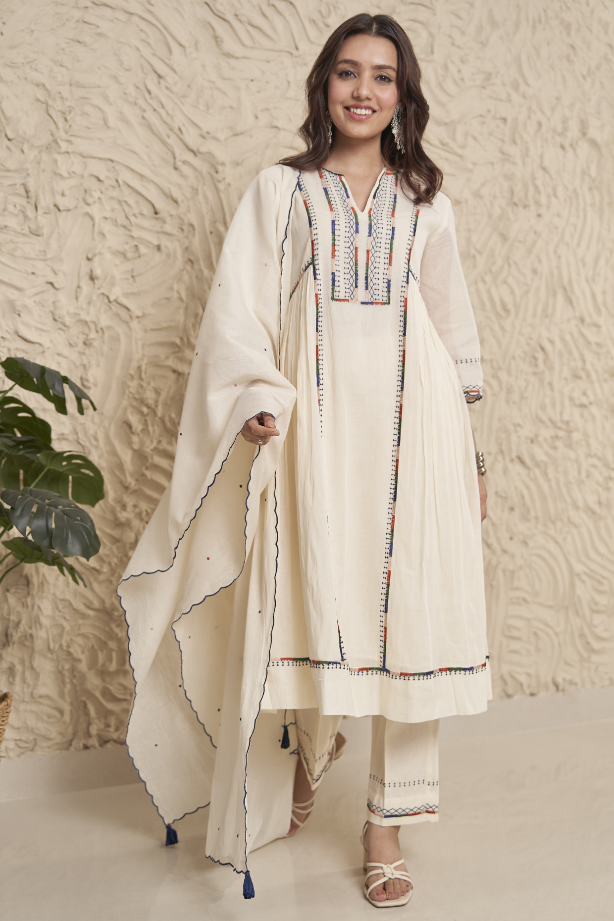 Ivory Mulmul Machine Embroidered Kurta Set by Samatvam By Anjali Bhaskar at Pernia's Pop Up Shop