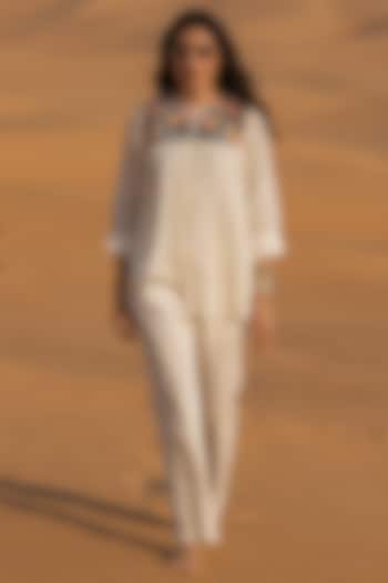 Ivory Mulmul Floral Embroidered Co-Ord Set by Samatvam By Anjali Bhaskar at Pernia's Pop Up Shop