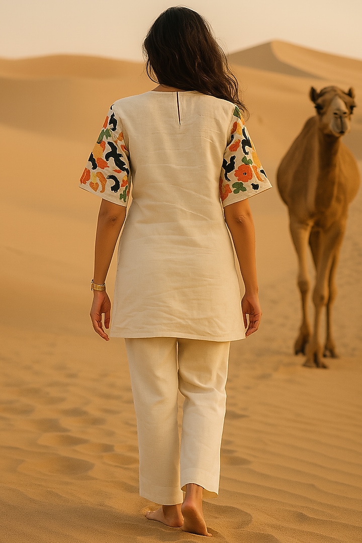 Ivory Mulmul Floral Embroidered Co-Ord Set by Samatvam By Anjali Bhaskar at Pernia's Pop Up Shop