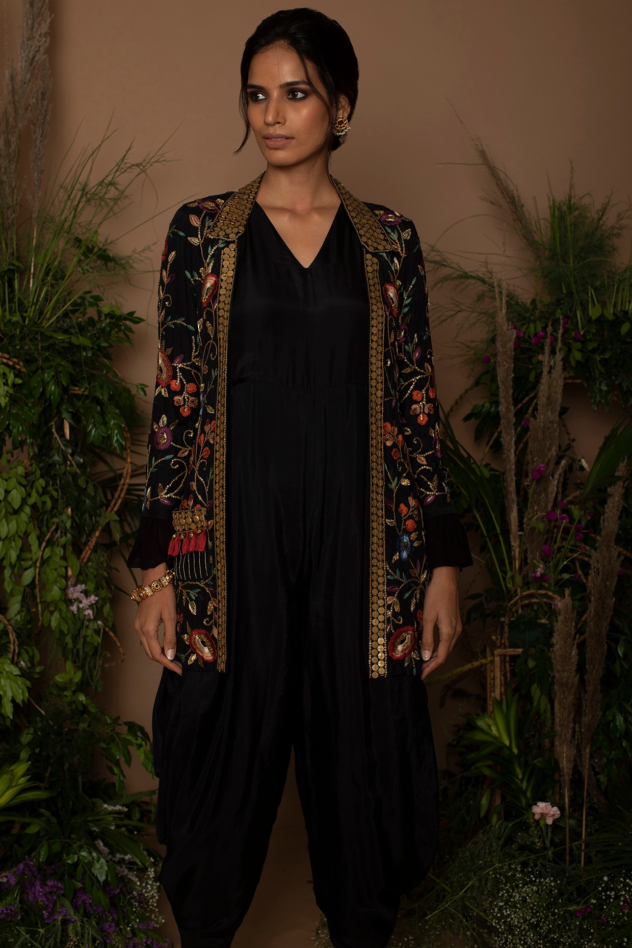 The Black Jumpsuit You'll Wear All Holiday Season Long - Julia Berolzheimer