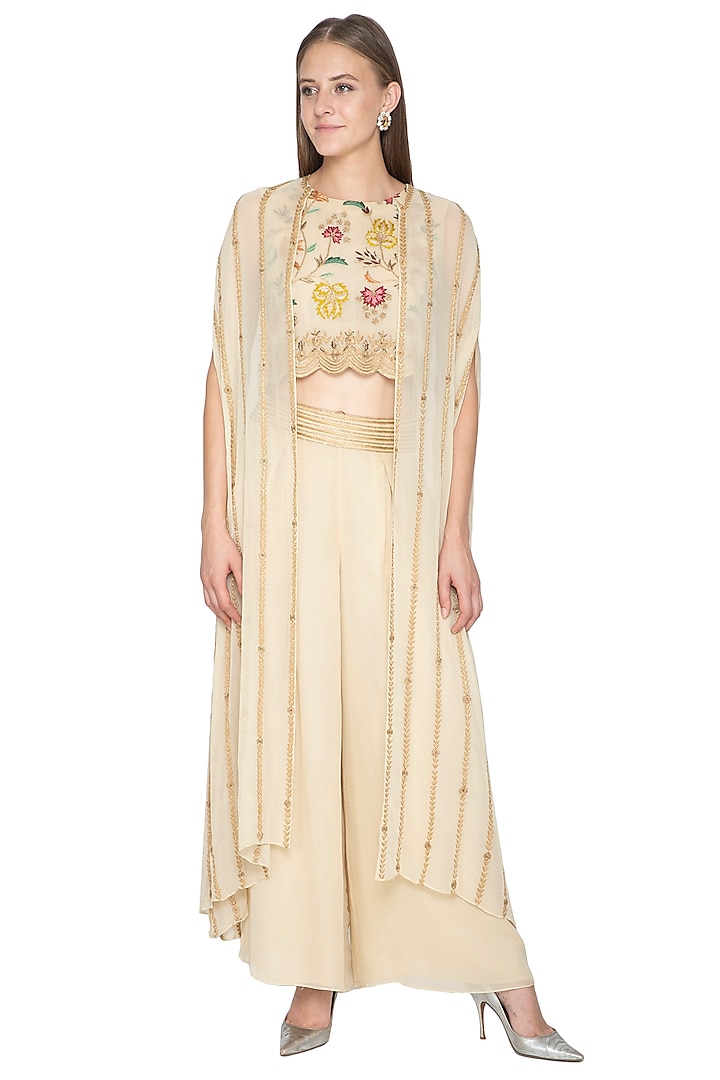 Ivory Embroidered Crop Top With Pants & Cape by Samatvam By Anjali Bhaskar