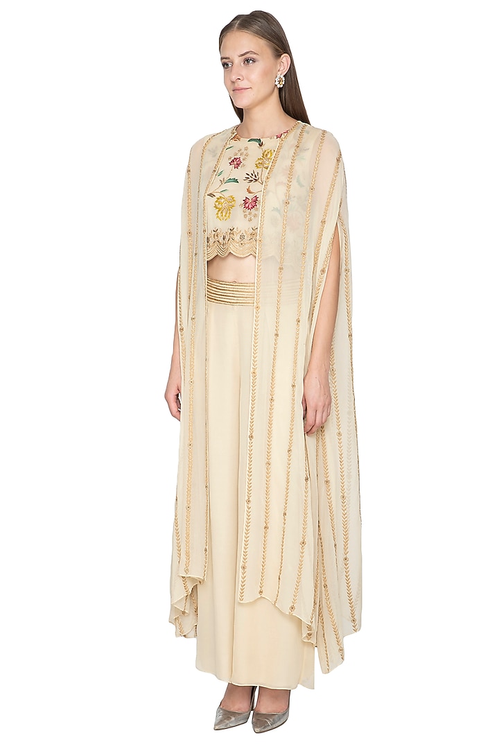 Ivory Embroidered Crop Top With Pants & Cape by Samatvam By Anjali Bhaskar at Pernia's Pop Up Shop