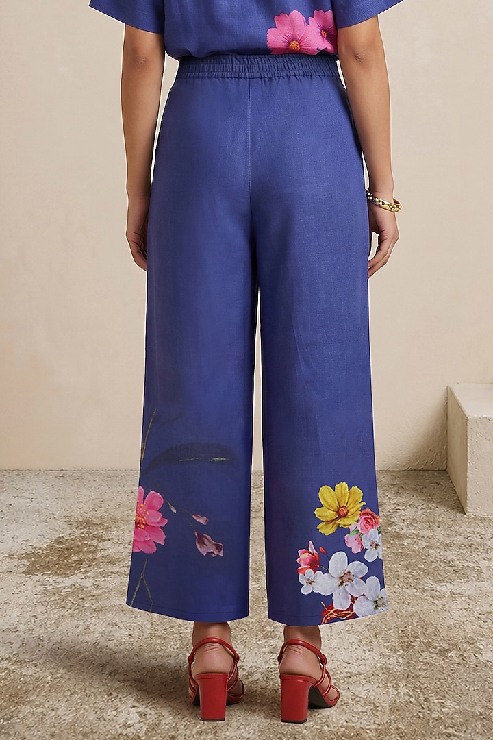Blue Linen Floral Motif Printed Pants by Satya Paul at Pernia's Pop Up Shop
