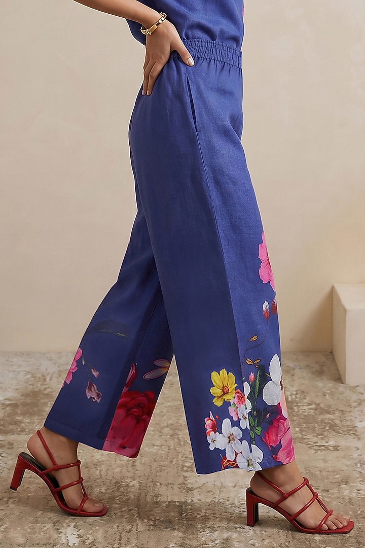 Blue Linen Floral Motif Printed Pants by Satya Paul at Pernia's Pop Up Shop