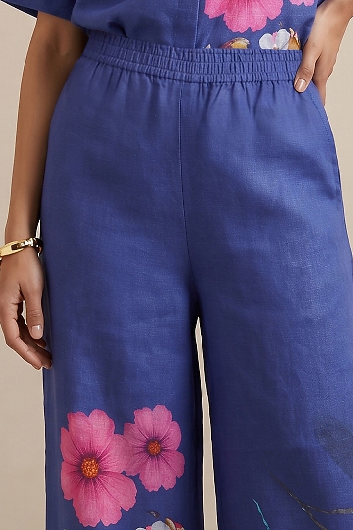 Blue Linen Floral Motif Printed Pants by Satya Paul at Pernia's Pop Up Shop