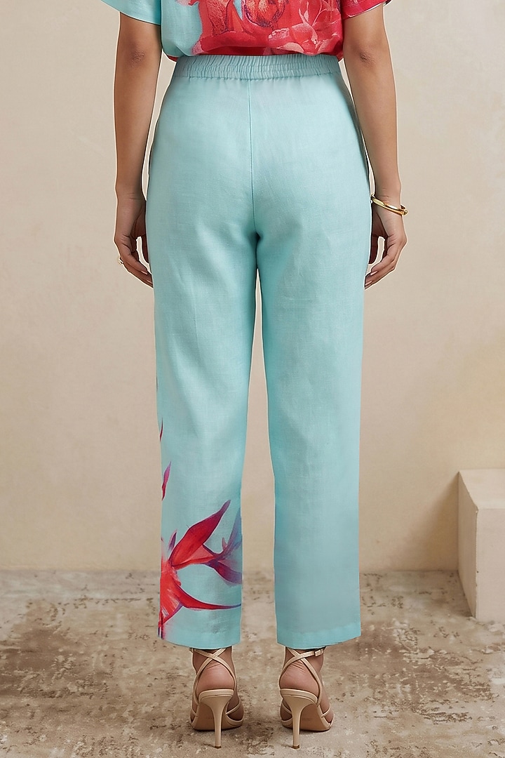 Blue Linen Floral Motif Printed Pants by Satya Paul at Pernia's Pop Up Shop