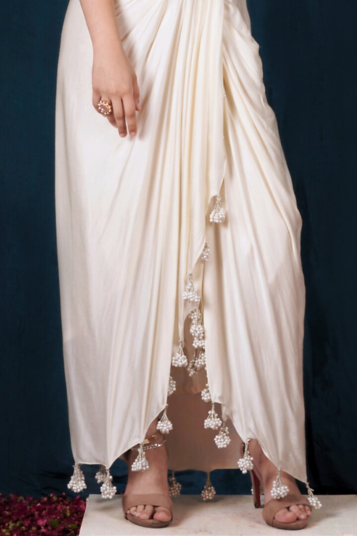 Off-White Modal Satin Sequins Embroidered Draped Skirt Set by SAUBHAGYA at Pernia's Pop Up Shop