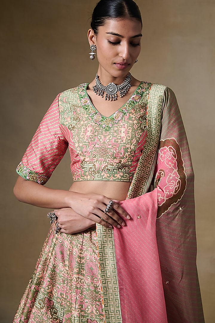 Powder Pink & Olive Green Raw Silk Gota Embroidered Lehenga Set by Saundh at Pernia's Pop Up Shop