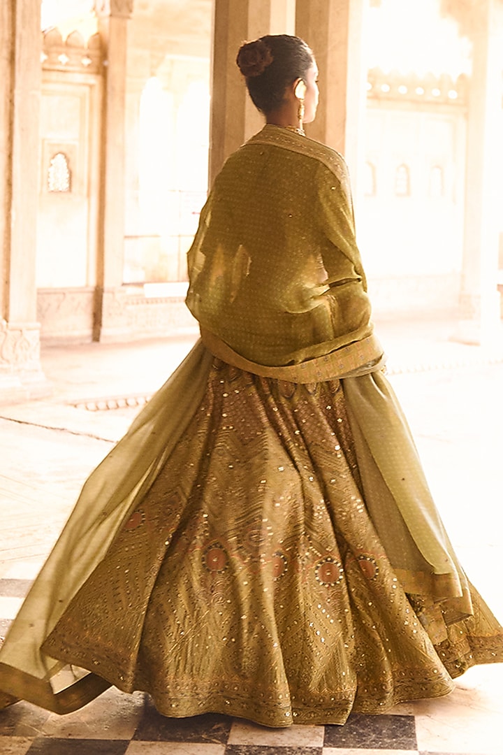 Olive Green Raw Silk Mirror Work Wedding Lehenga Set by Saundh at Pernia's Pop Up Shop