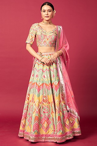 Pink Raw Silk Chevron Printed & Mirror Work Lehenga Set by Saundh