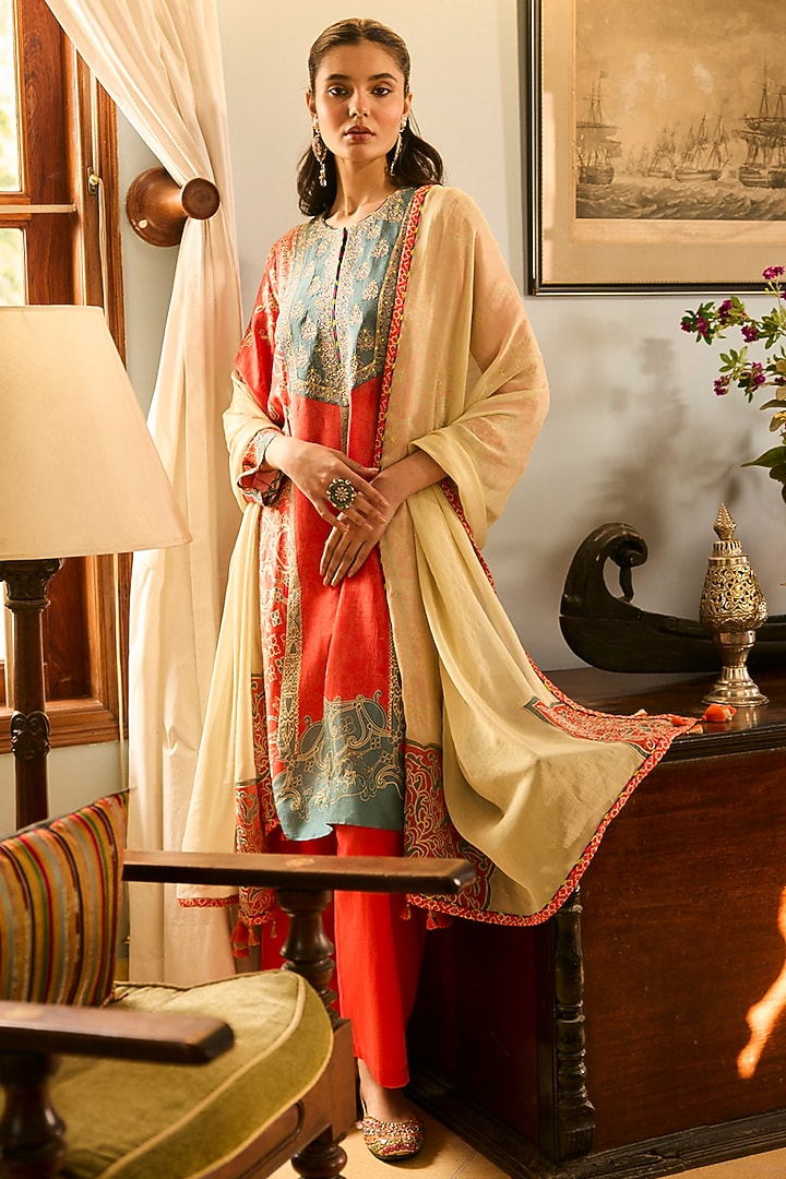 Orange Raw Silk Printed & Resham Embroidered Kurta Set by Saundh at Pernia's Pop Up Shop