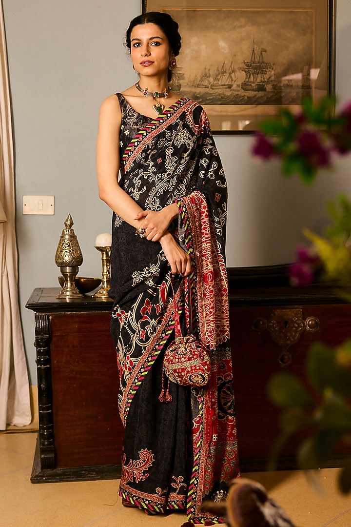 Black Muslin Silk Printed & Resham Embroidered Festive Saree Set by Saundh at Pernia's Pop Up Shop
