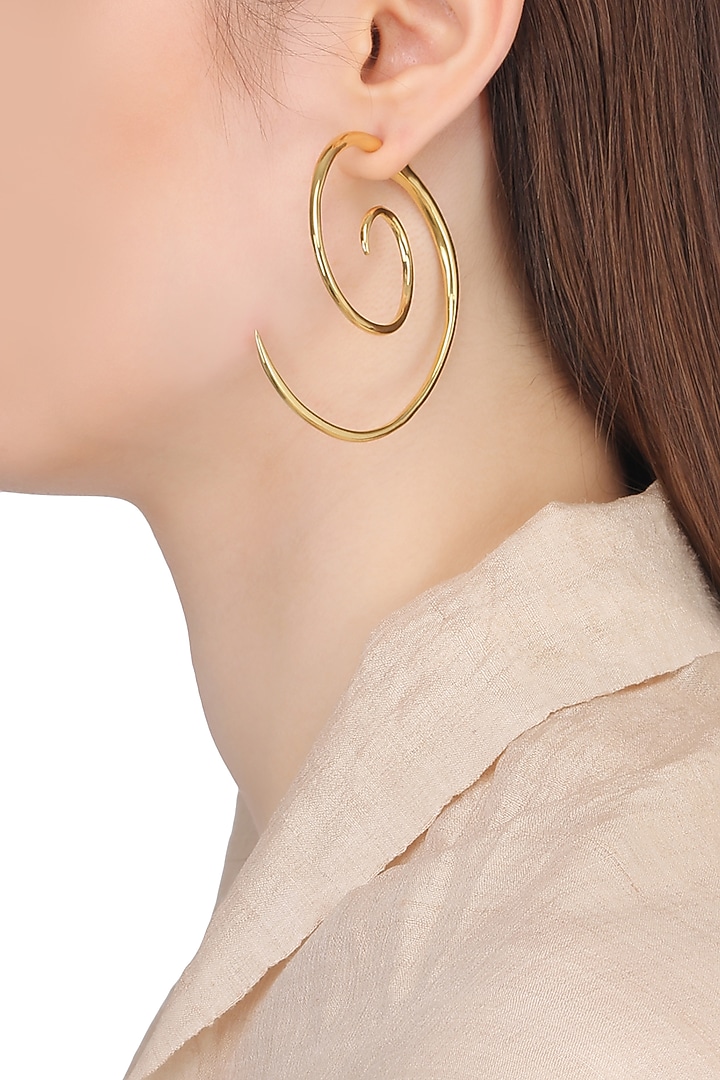 Gold plated spiral earrings available only at Pernia's Pop Up Shop.