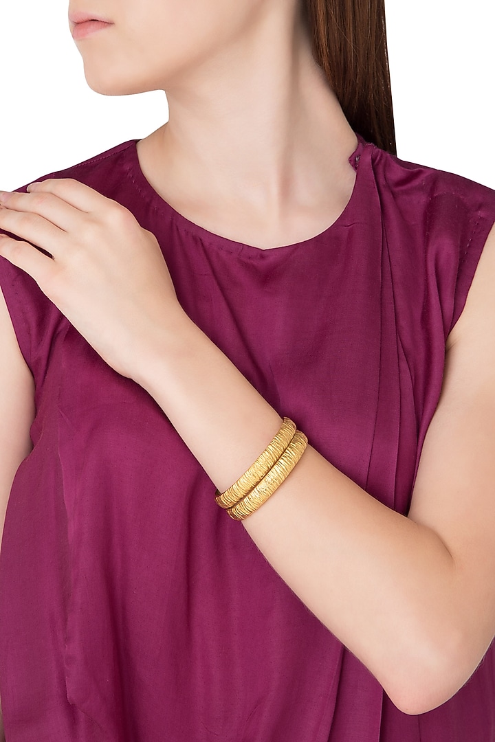 Set of 2 gold plated bangles available only at Pernia's Pop Up Shop.