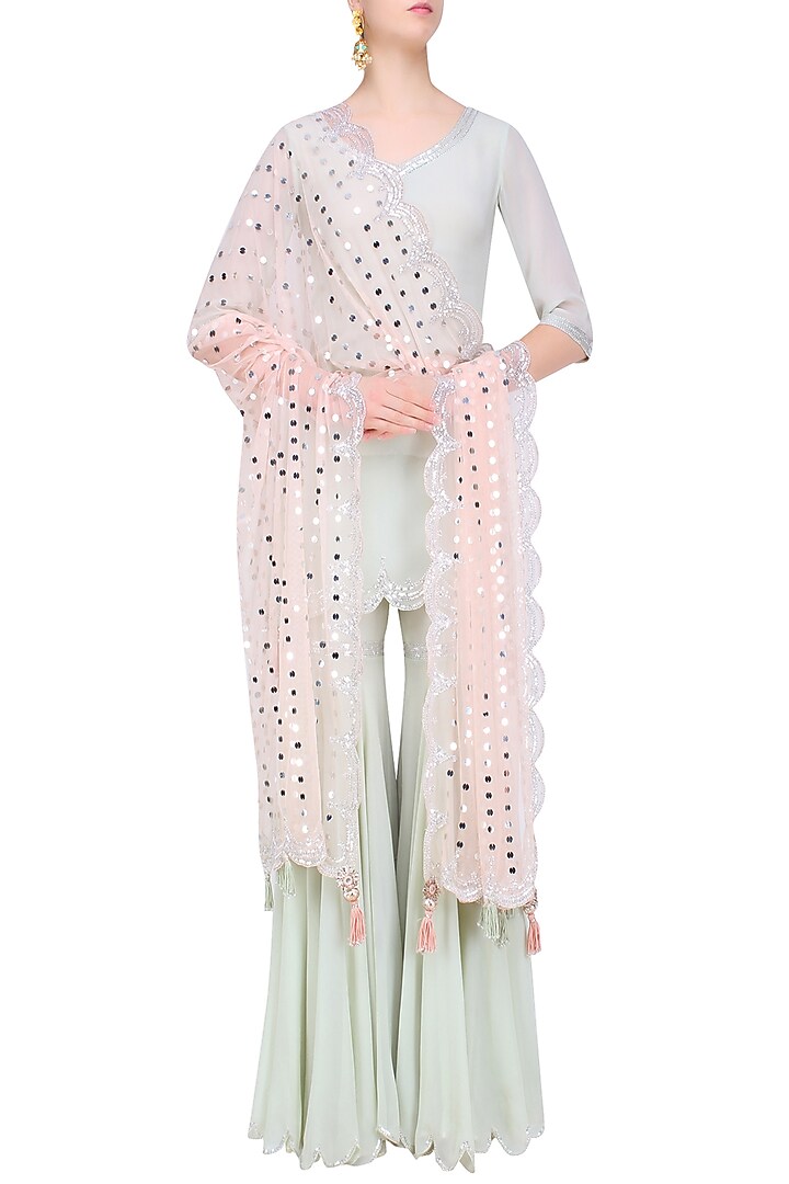Pale blue sequins embroidered kurta and sharara pants set available only at Pernia's Pop Up Shop.