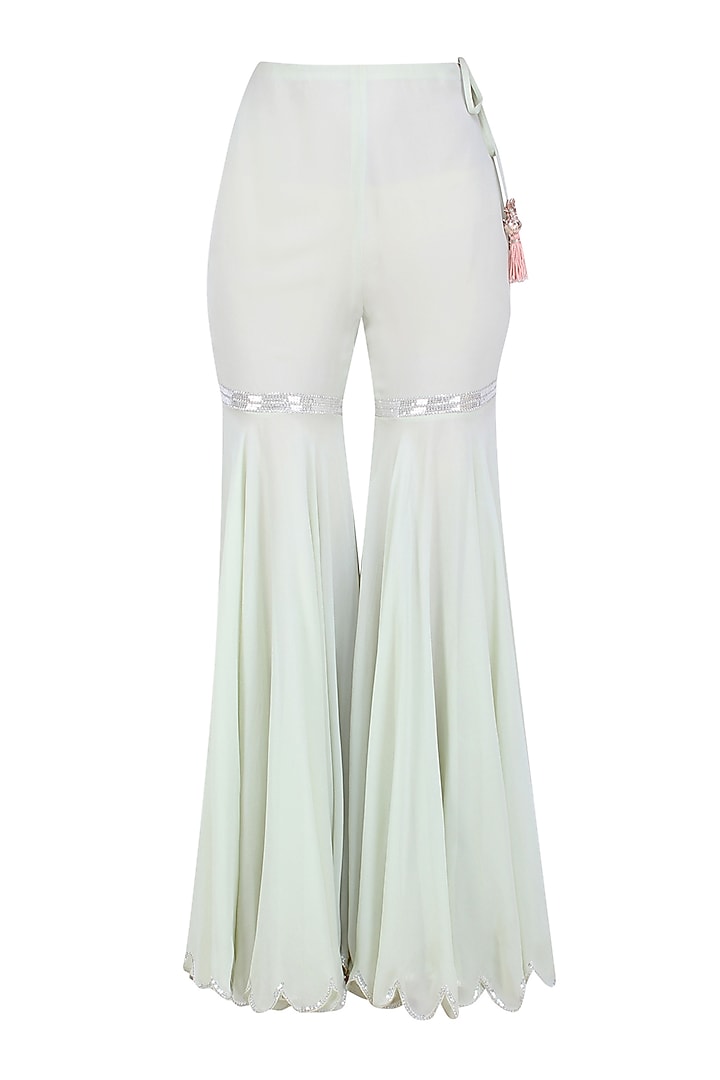 Pale blue sequins embroidered kurta and sharara pants set available only at Pernia's Pop Up Shop.