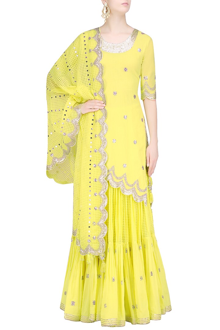 Lemon and gold gota patti work kurta and frilled skirt set available only at Pernia's Pop Up Shop.