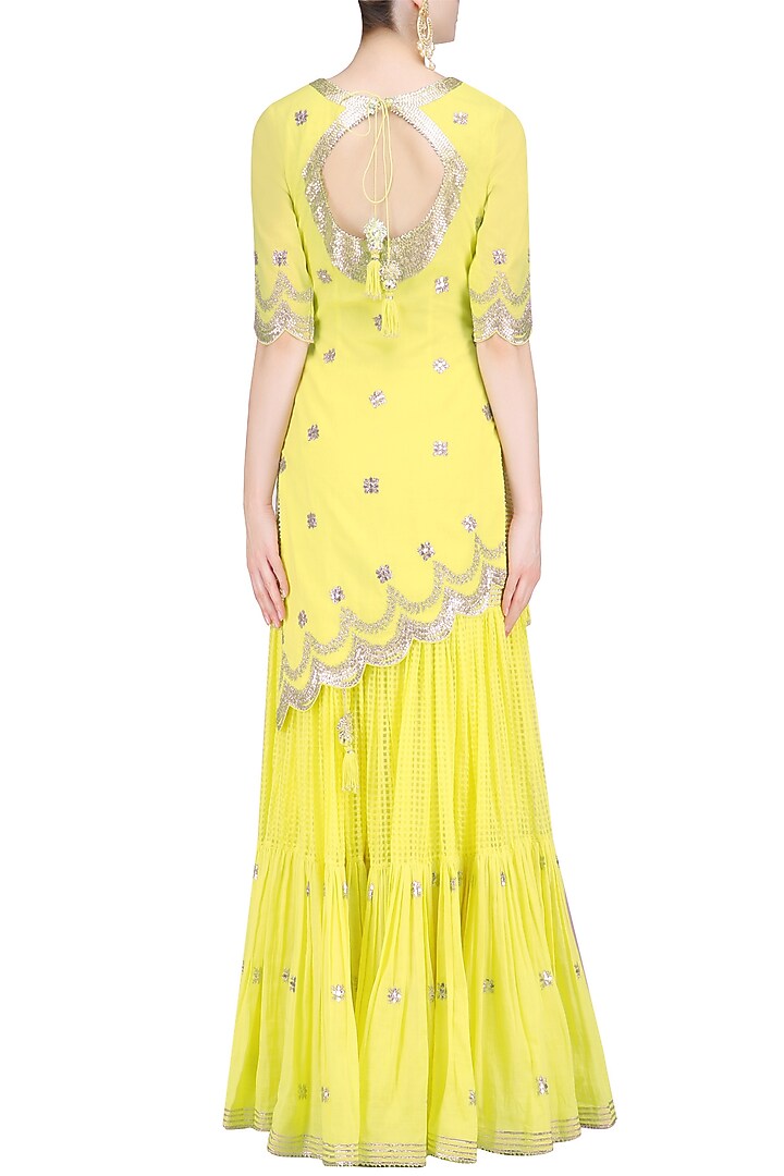 Lemon and gold gota patti work kurta and frilled skirt set available only at Pernia's Pop Up Shop.