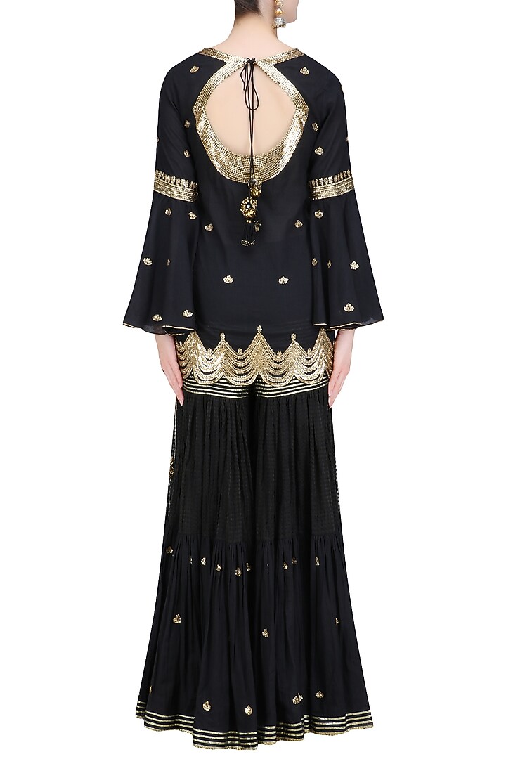 Black gota patti work kurta and sharara set available only at Pernia's Pop Up Shop.
