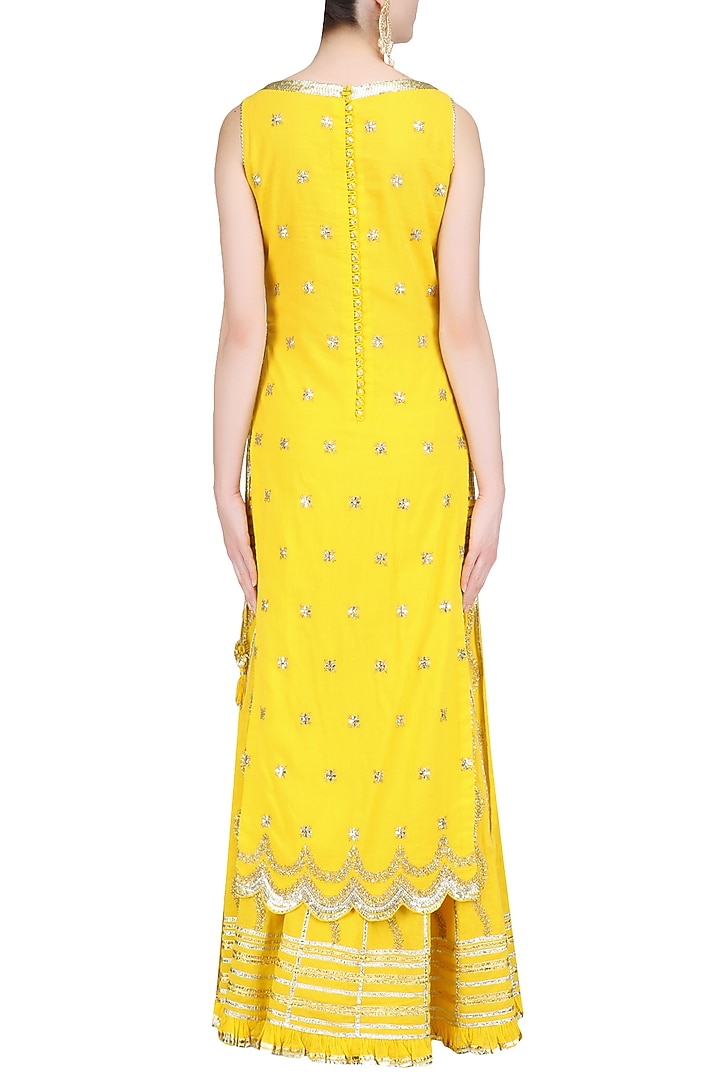 Yellow gota patti work kurta and sharara pants set available only at Pernia's Pop Up Shop.