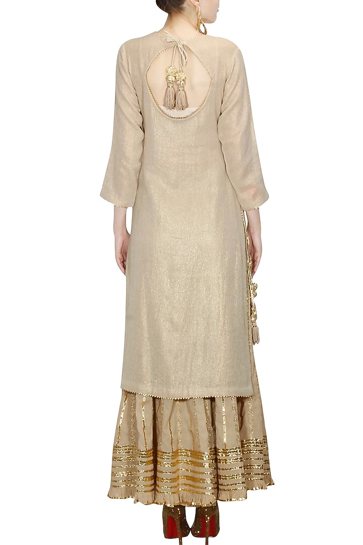 Beige and gold gota patti work kurta and sharara set available only at Pernia's Pop Up Shop.