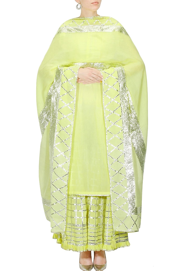 Lemon yellow and silver gota patti work kurta and sharara set available only at Pernia's Pop Up Shop.