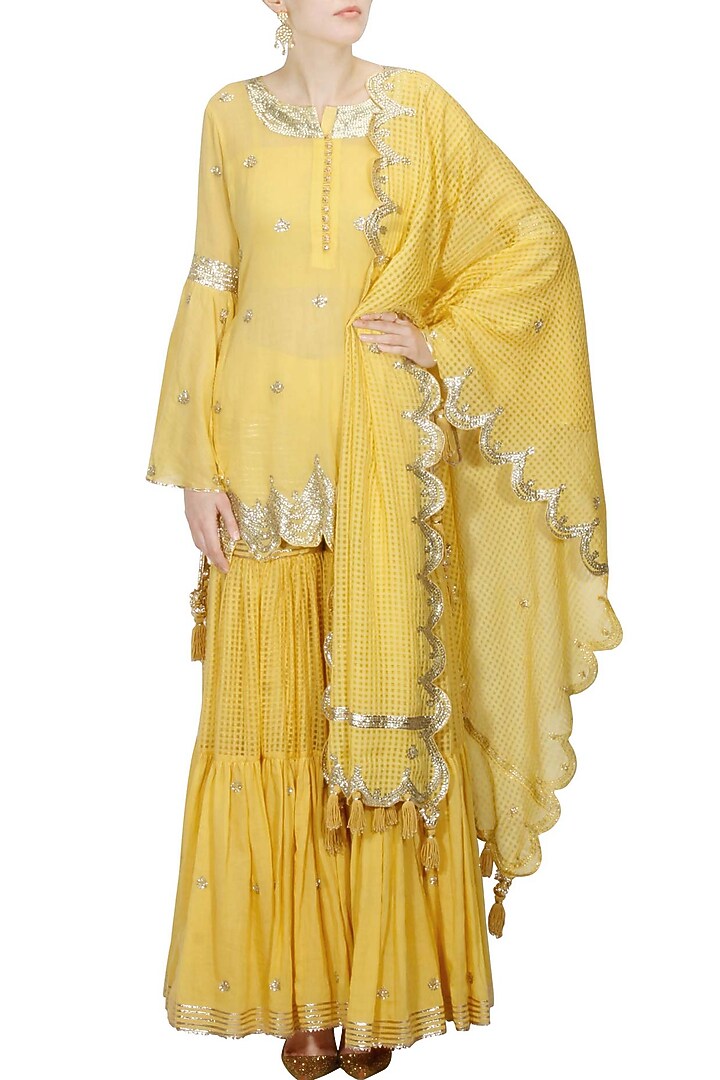 Mustard yellow and gold gota patti work kurta and sharara set available only at Pernia's Pop Up Shop.
