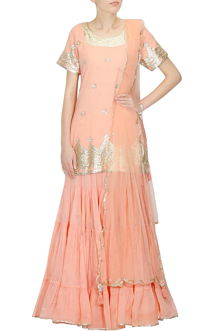 Peach and gold gota patti work kurta and frilled skirt set available only at Pernia's Pop Up Shop.