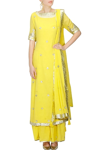 Bright yellow and gold gota patti work kurta and sharara set by Sukriti & Aakriti