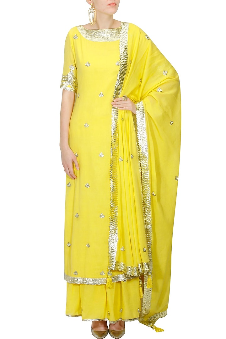 Bright yellow and gold gota patti work kurta and sharara set available only at Pernia's Pop Up Shop.