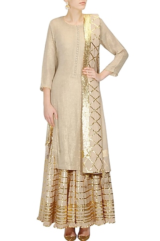 Beige and gold gota patti work kurta and checkered sharara set by Sukriti & Aakriti