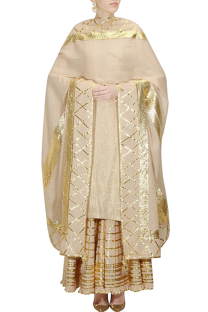 Bright yellow and gold gota patti work kurta and checkered sharara set available only at Pernia's Pop Up Shop.
